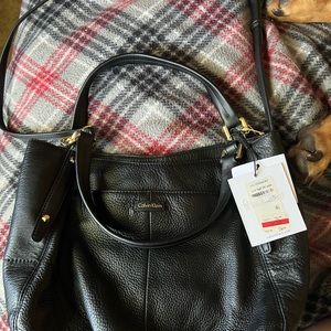 Calvin Klein black leather w/ long strap